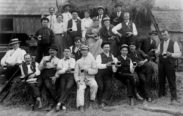 A beer drinking group pauses the party for a photo, ca. 1905